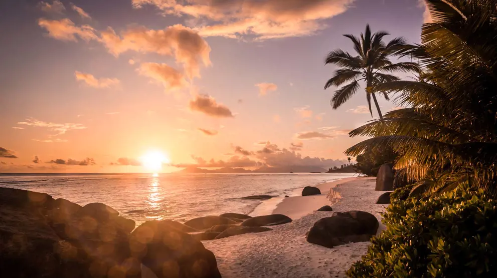Se magiske solnedgange på din Seychellerne-rejse.